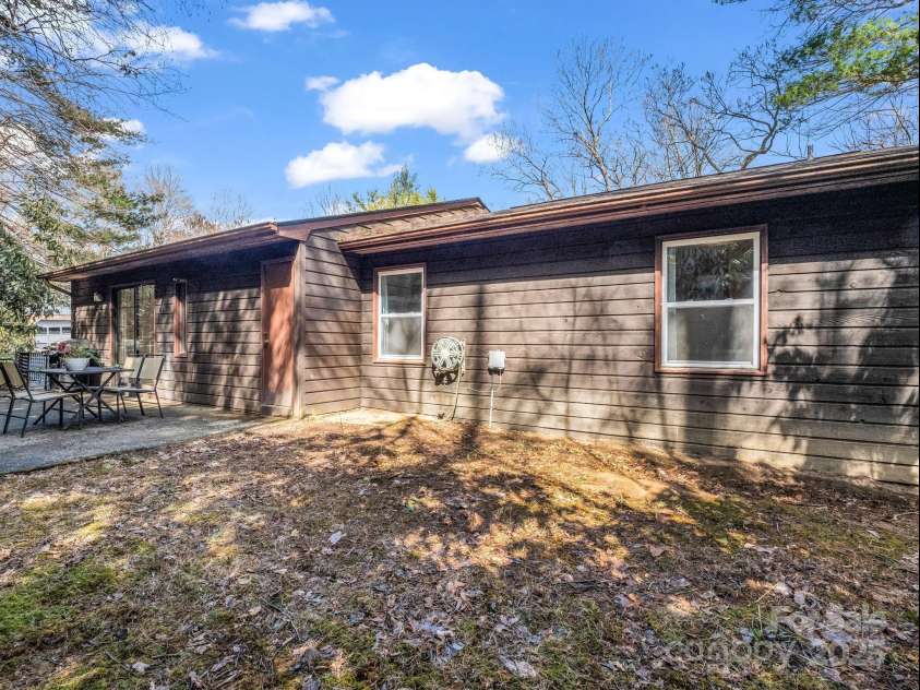 232 Stonebrook Drive, Hendersonville, NC 28791.  MLS# CAR4226613, YatesRealty ID 16783. Back Patio