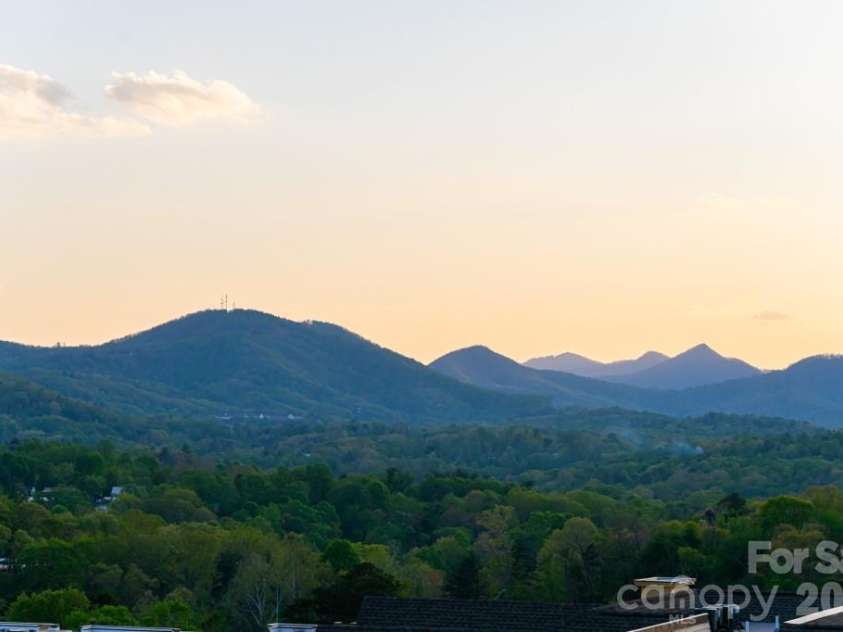 604 Storybook Villas Trail, Asheville, NC 28804.  MLS# CAR4375406, YatesRealty ID 16786. Long range views