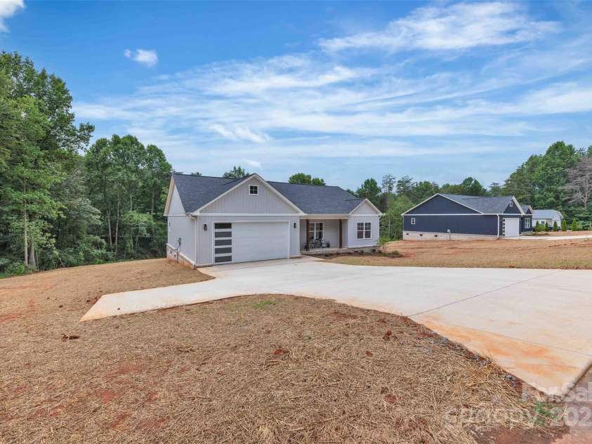 63 Cornerstone Drive, Taylorsville, NC 28681.  MLS# CAR4265503, YatesRealty ID 16787. Concrete Drive