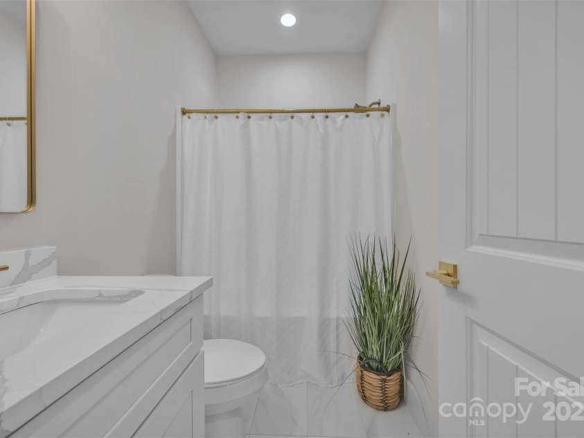 63 Cornerstone Drive, Taylorsville, NC 28681.  MLS# CAR4265503, YatesRealty ID 16787. Guest Bathroom