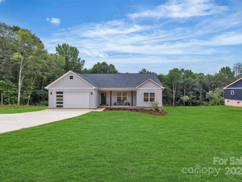 63 Cornerstone Drive, Taylorsville, NC 28681.  MLS# CAR4265503, YatesRealty ID 16787. Photo edited to show what yard will look like when grass is established