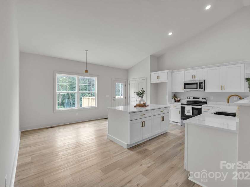 63 Cornerstone Drive, Taylorsville, NC 28681.  MLS# CAR4265503, YatesRealty ID 16787. Quartz countertops