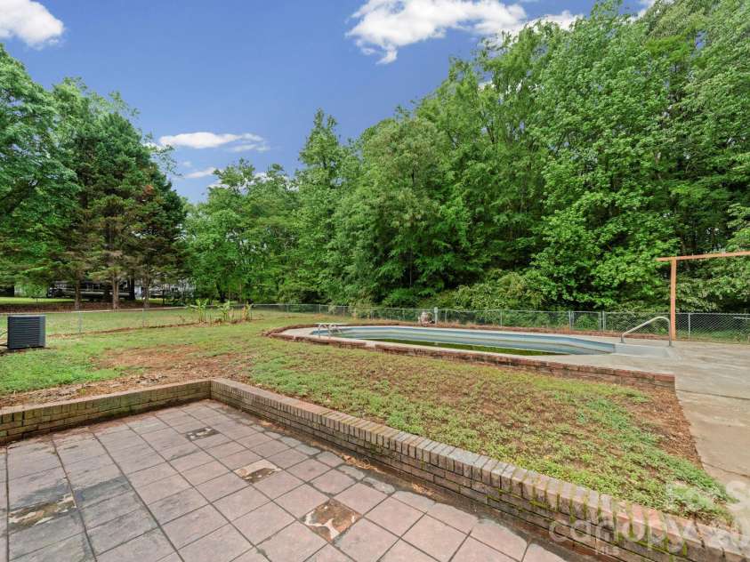 4510 Springview Drive, Monroe, NC 28112.  MLS# CAR4392466, YatesRealty ID 16788. Back Patio
