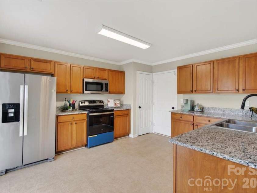 5227 Swearngan Road, Charlotte, NC 28216.  MLS# CAR4365895, YatesRealty ID 16789. 