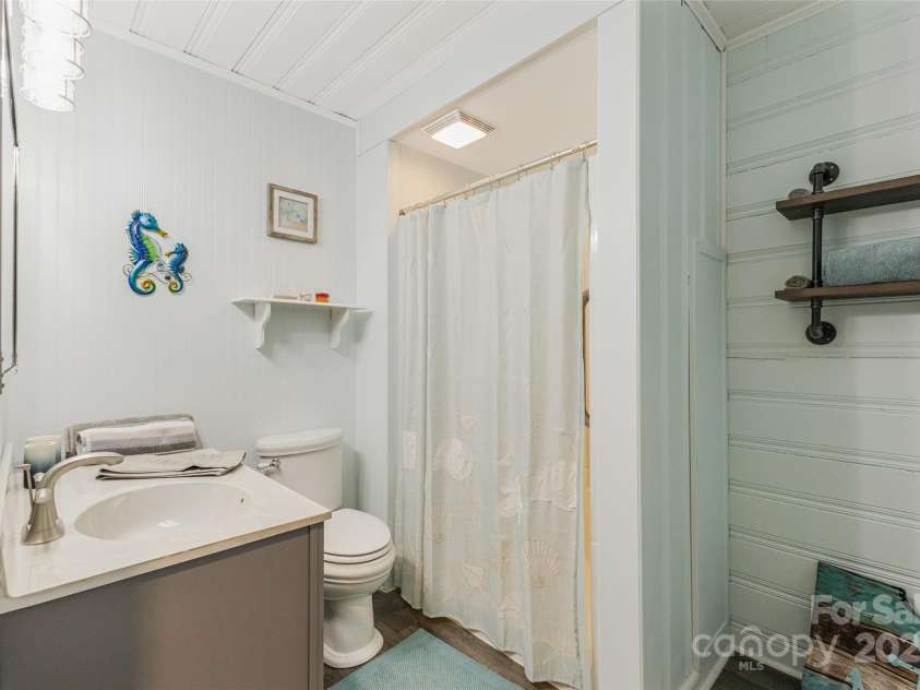 115 66th Street, Oak Island, NC 28465.  MLS# CAR4231737, YatesRealty ID 1679. 