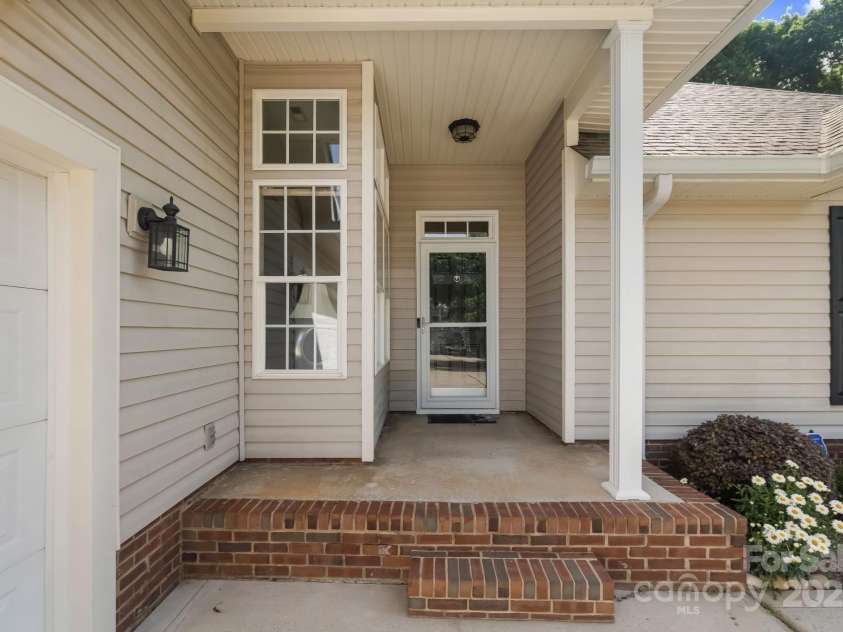 12013 Regent Ridge Lane, Charlotte, NC 28278.  MLS# CAR4254769, YatesRealty ID 16793. Front covered porch