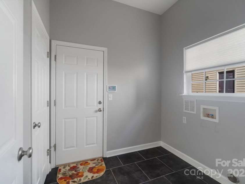 12013 Regent Ridge Lane, Charlotte, NC 28278.  MLS# CAR4254769, YatesRealty ID 16793. Laundry off of Kitchen & garage, 2 pantries/storage