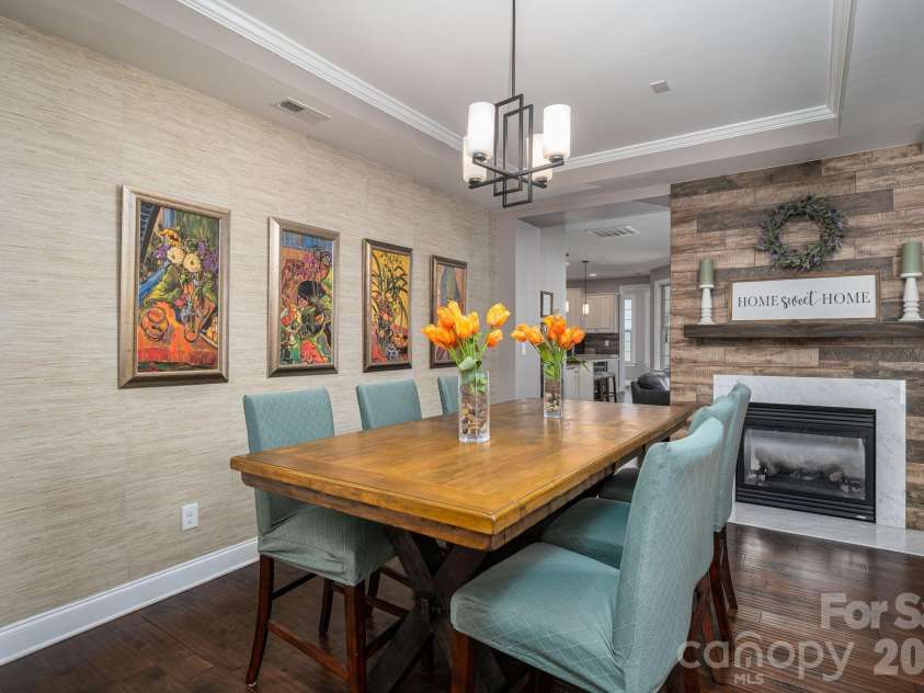 1819 Chesterfield Drive, Belmont, NC 28012.  MLS# CAR4349946, YatesRealty ID 16794. Dining Room w/double sided fireplace