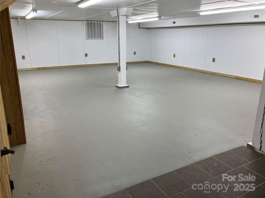 157 Main Street, Bostic, NC 28018.  MLS# CAR4329921, YatesRealty ID 1680. Downstairs floor space 1