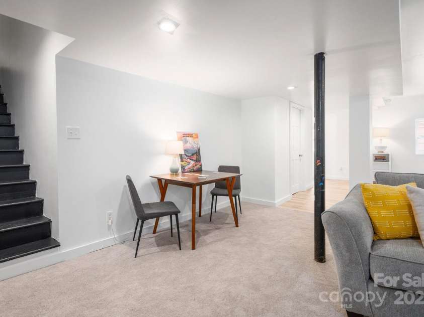 12 Canterbury Road, Asheville, NC 28805.  MLS# CAR4260435, YatesRealty ID 16801. Stairs Leading to Basement