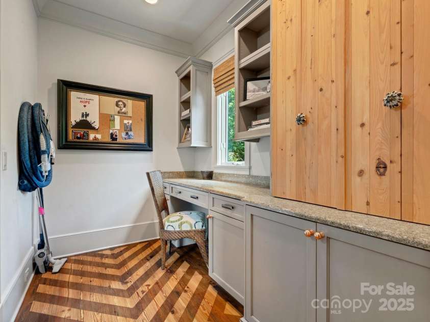 7906 Skye Lochs Drive, Waxhaw, NC 28173.  MLS# CAR4253185, YatesRealty ID 16803. Home office features chevron floors