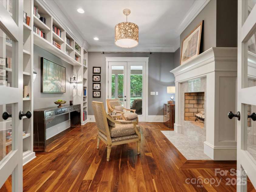 7906 Skye Lochs Drive, Waxhaw, NC 28173.  MLS# CAR4253185, YatesRealty ID 16803. Office Library has built ins + dual sided fireplace
