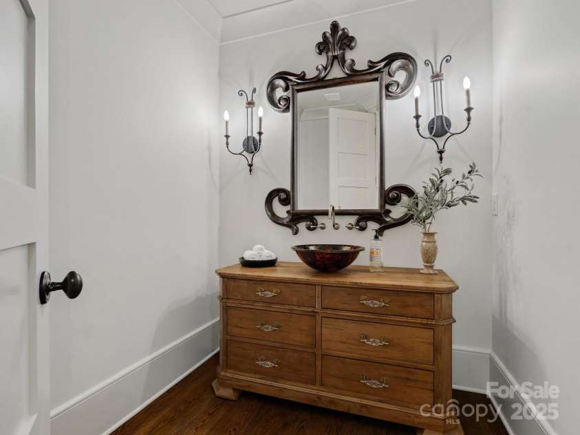 7906 Skye Lochs Drive, Waxhaw, NC 28173.  MLS# CAR4253185, YatesRealty ID 16803. Powder room with custom vanity