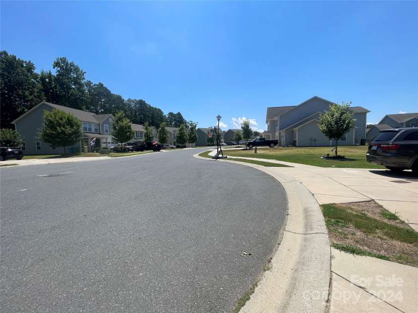 127 Tranquil Court, Locust, NC 28097.  MLS# CAR4152427, YatesRealty ID 1681. Cul-de-sac entrance and view of neighborhood