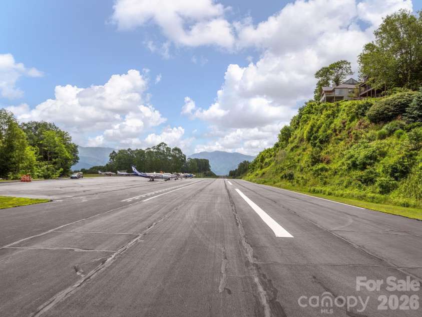 37 Grinnin Sun Road, Burnsville, NC 28714.  MLS# CAR4352768, YatesRealty ID 16816. Air strip