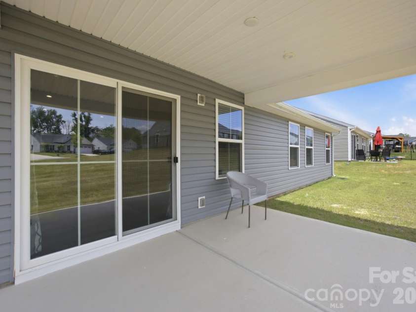 621 Grandiflora Avenue, Lancaster, SC 29720.  MLS# CAR4397110, YatesRealty ID 16823. Covered back patio