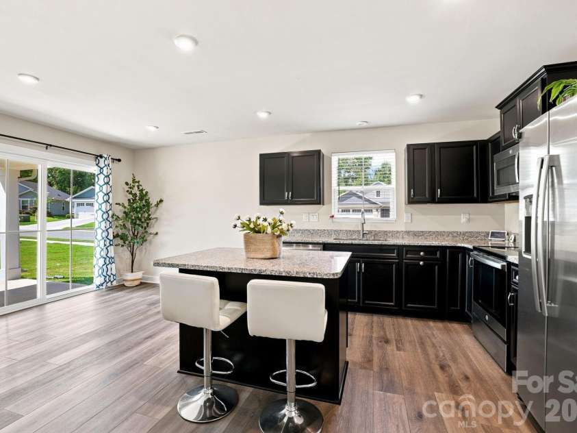 621 Grandiflora Avenue, Lancaster, SC 29720.  MLS# CAR4397110, YatesRealty ID 16823. Large kitchen island with additional breakfast area for a table