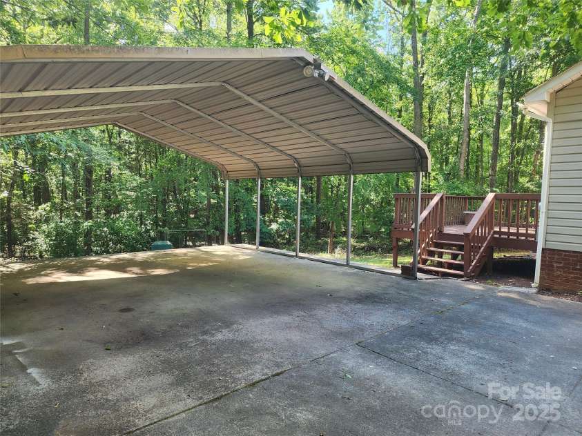 4409 Homestead Road, Rock Hill, SC 29732.  MLS# CAR4255629, YatesRealty ID 16826. Double Carport, large driveway, side porch/deck