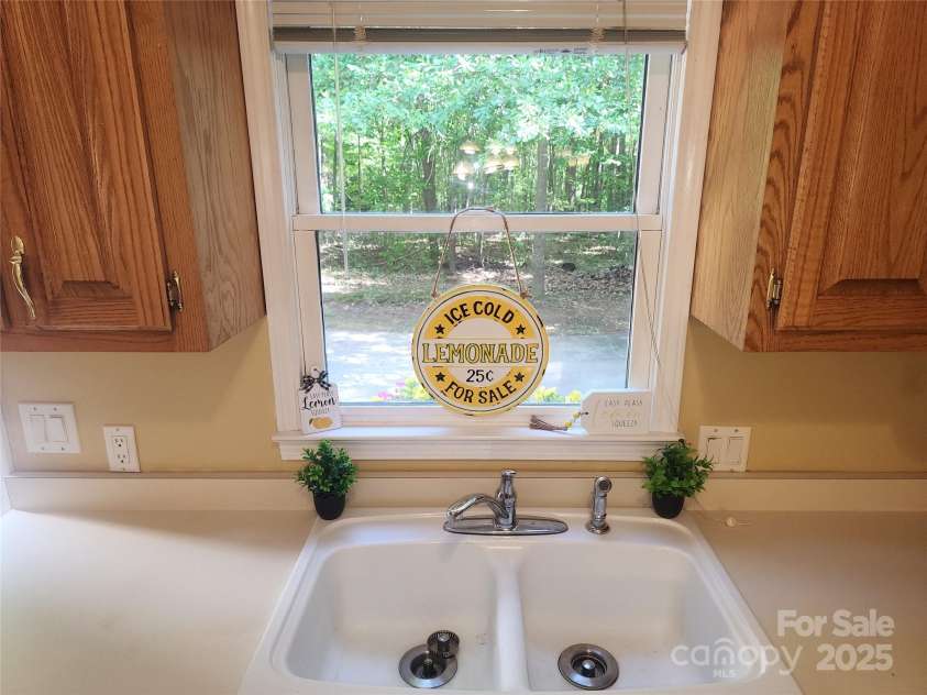 4409 Homestead Road, Rock Hill, SC 29732.  MLS# CAR4255629, YatesRealty ID 16826. Kitchen Window overlooks driveway