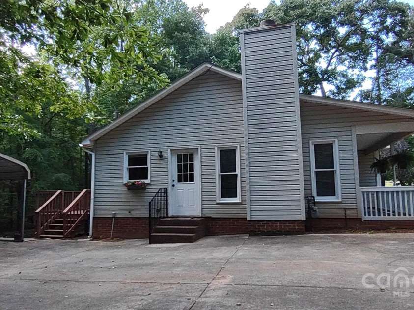 4409 Homestead Road, Rock Hill, SC 29732.  MLS# CAR4255629, YatesRealty ID 16826. Side view of home