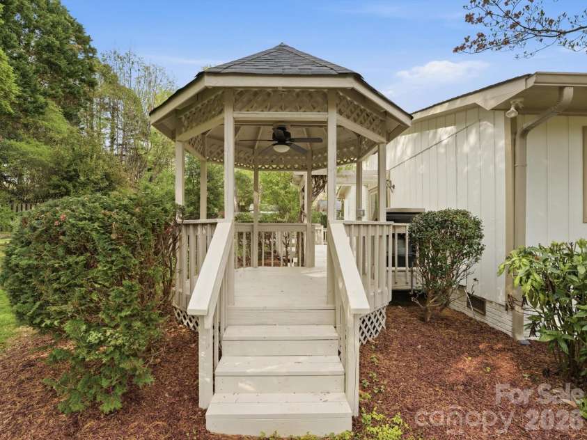 814 Twin Oaks Road, Davidson, NC 28036.  MLS# CAR4360259, YatesRealty ID 16830. Cute pergola