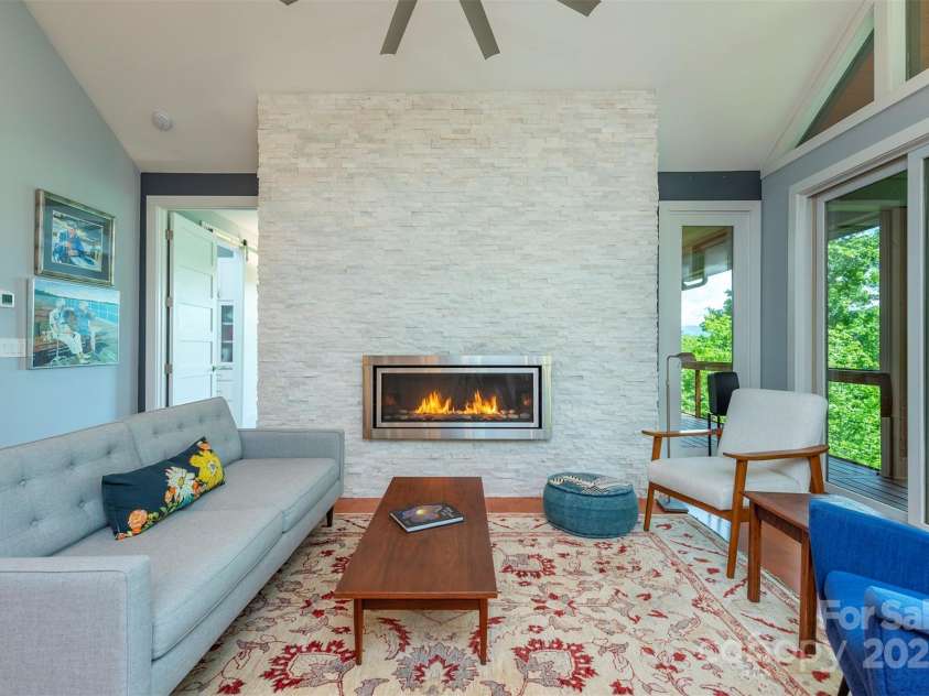 201 Ruffed Grouse Lane, Waynesville, NC 28786.  MLS# CAR4257615, YatesRealty ID 16833. Clean lines with primary bedroom to the left