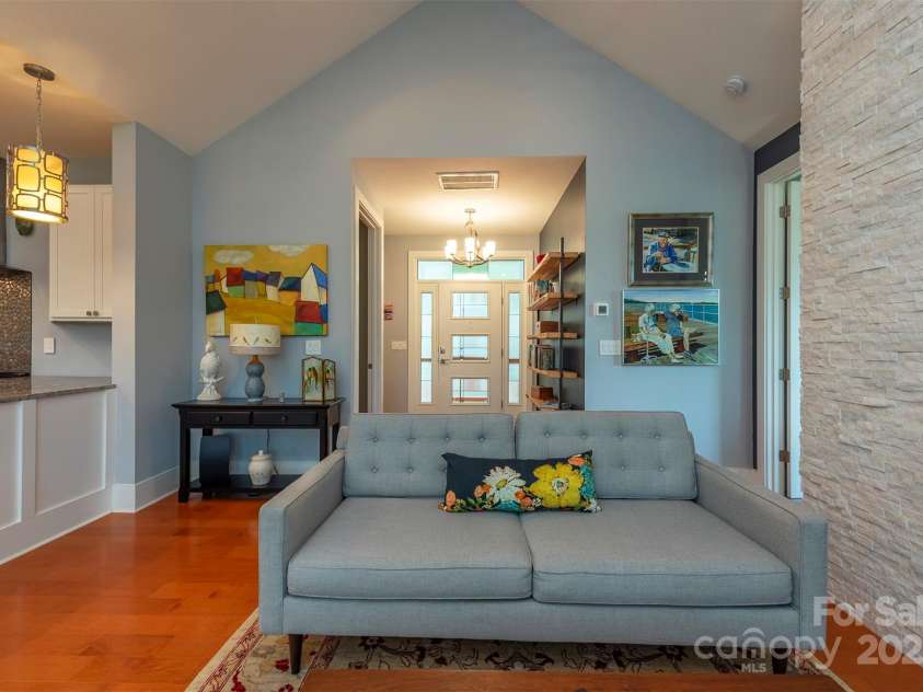 201 Ruffed Grouse Lane, Waynesville, NC 28786.  MLS# CAR4257615, YatesRealty ID 16833. Looking at foyer from living area