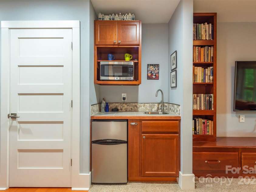 201 Ruffed Grouse Lane, Waynesville, NC 28786.  MLS# CAR4257615, YatesRealty ID 16833. Lower level kitchenette