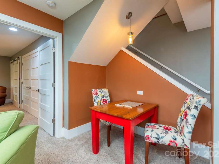 201 Ruffed Grouse Lane, Waynesville, NC 28786.  MLS# CAR4257615, YatesRealty ID 16833. Lower level reading/gaming nook