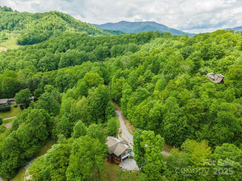 201 Ruffed Grouse Lane, Waynesville, NC 28786.  MLS# CAR4257615, YatesRealty ID 16833. Property tucked in the foothills