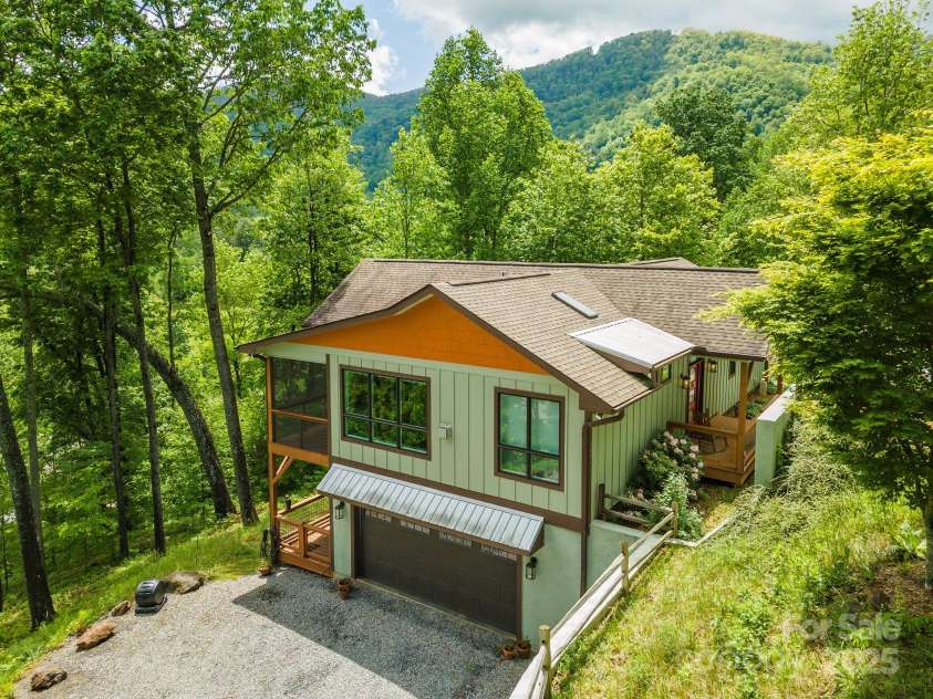 201 Ruffed Grouse Lane, Waynesville, NC 28786.  MLS# CAR4257615, YatesRealty ID 16833. Two car garage with ample parking