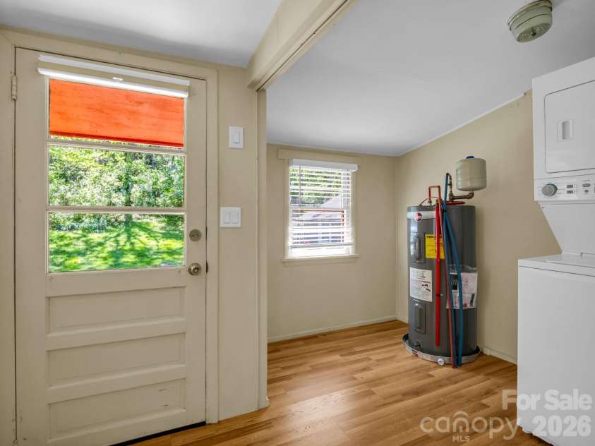 159 Onteora Boulevard, Asheville, NC 28803.  MLS# CAR4370982, YatesRealty ID 16834. Utility and laundry room with exit to back yard