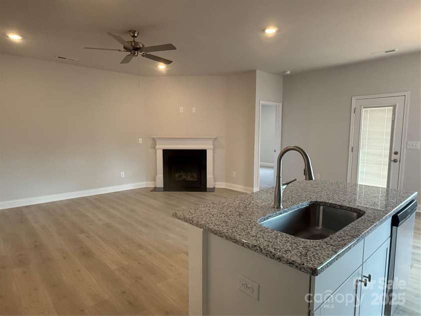 713 Inwood Hill Drive, Gastonia, NC 28056.  MLS# CAR4234423, YatesRealty ID 16839. Family Room with Gas Fireplace