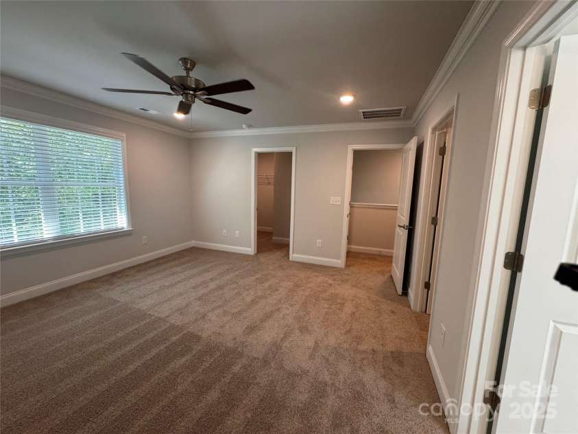 4049 Port Richmond Avenue, Gastonia, NC 28056.  MLS# CAR4192904, YatesRealty ID 16841. Primary bedroom with second walk-in closet
