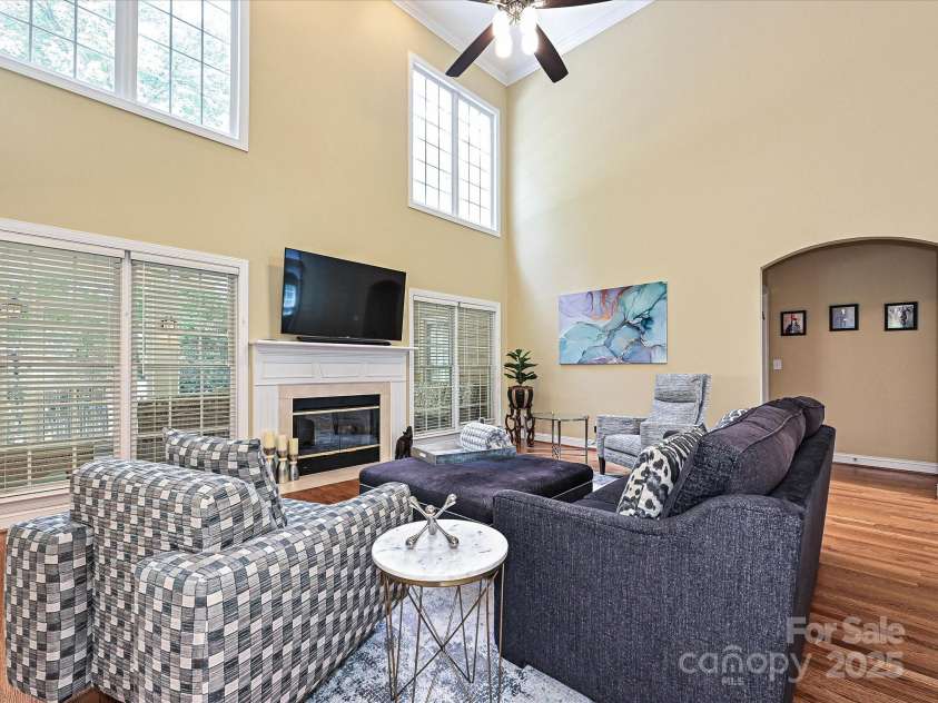 2406 Tarleton Twins Terrace, Charlotte, NC 28270.  MLS# CAR4261443, YatesRealty ID 16844. Great Room with gas log fireplace