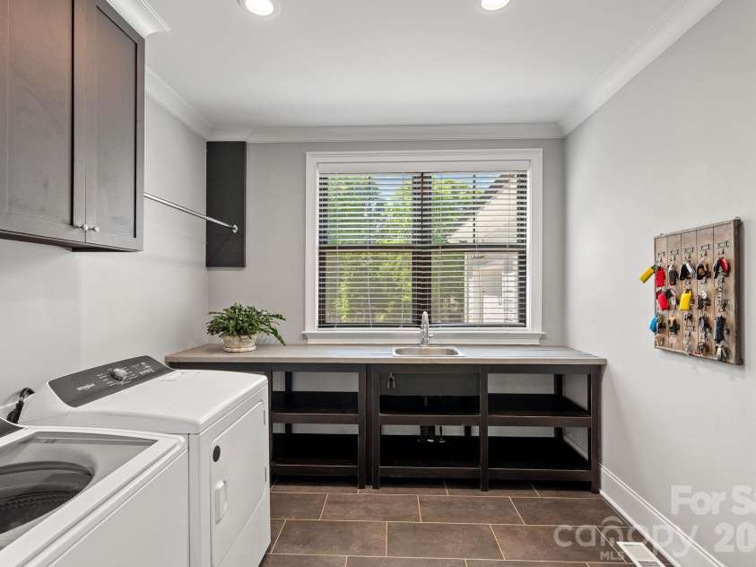 1420 Roundstone Road, Sherrills Ford, NC 28673.  MLS# CAR4369339, YatesRealty ID 16847. Bright and oversized laundry