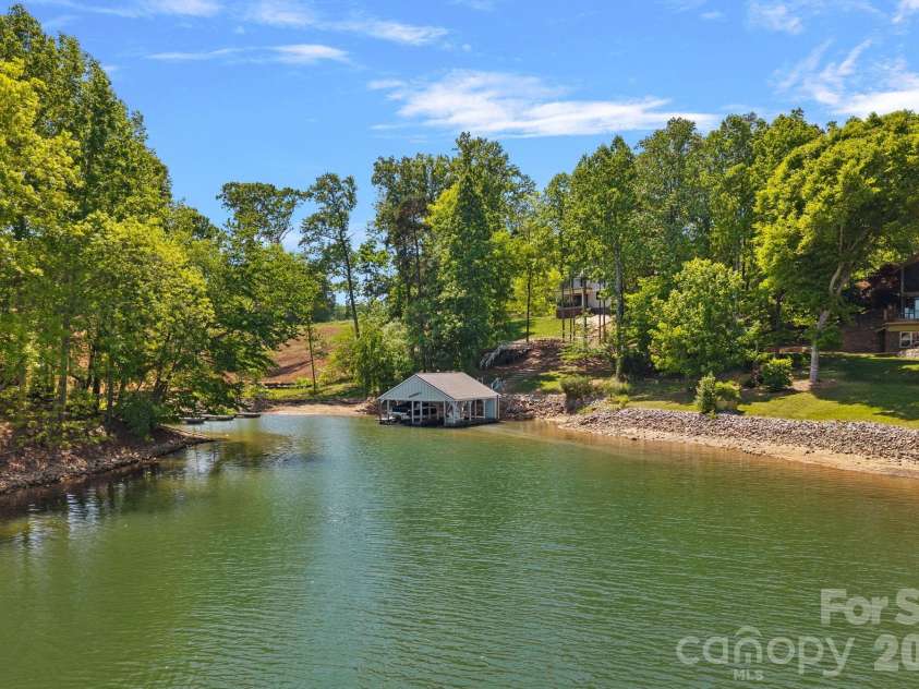 1420 Roundstone Road, Sherrills Ford, NC 28673.  MLS# CAR4369339, YatesRealty ID 16847. Lancaster Custom Docks recently dredged to the dock to further enhance the waterfront experience. 