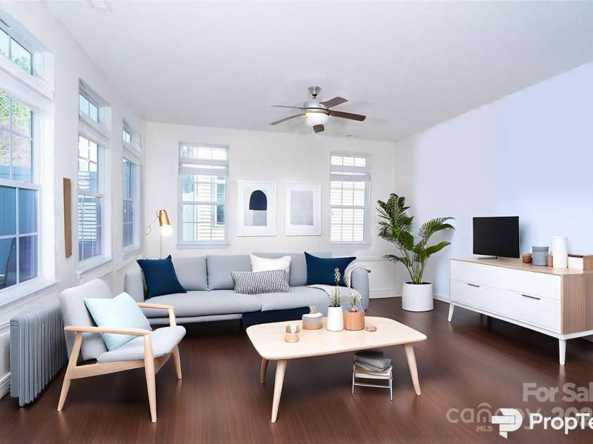 9760 Springholm Drive, Charlotte, NC 28278.  MLS# CAR4221424, YatesRealty ID 16853. Family Room (Virtually Staged)