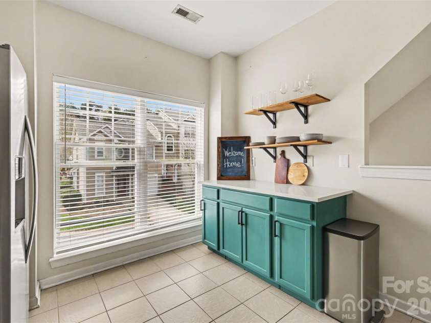 2729 Avalon Loop Road, Charlotte, NC 28269.  MLS# CAR4366095, YatesRealty ID 16859. Built-in cabinetry for stylish storage and functionality.