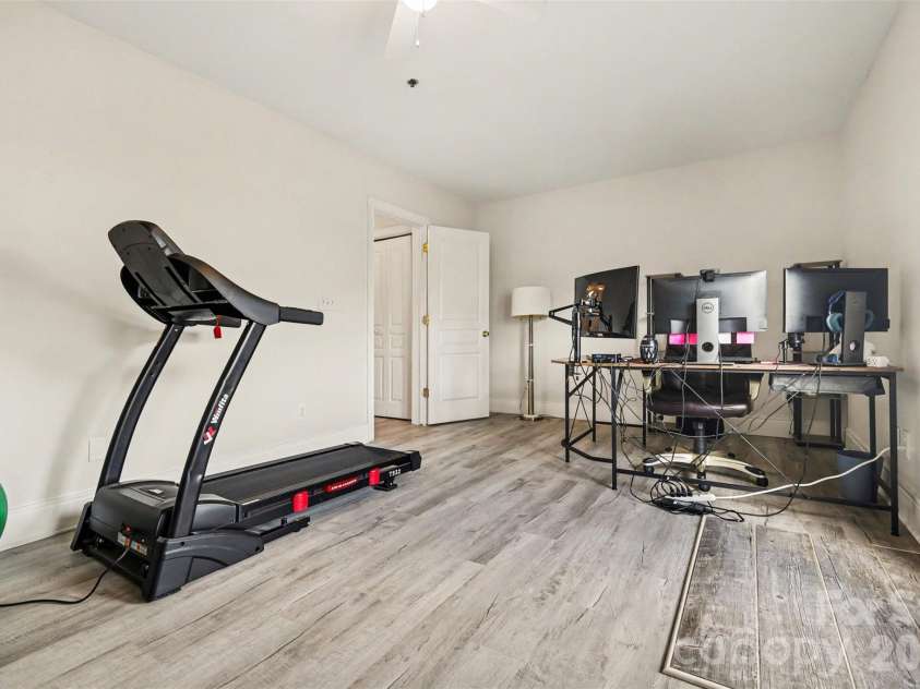2729 Avalon Loop Road, Charlotte, NC 28269.  MLS# CAR4366095, YatesRealty ID 16859. Convenient lower-level access to the laundry area and attached one-car garage, adding functionality and ease to everyday living.