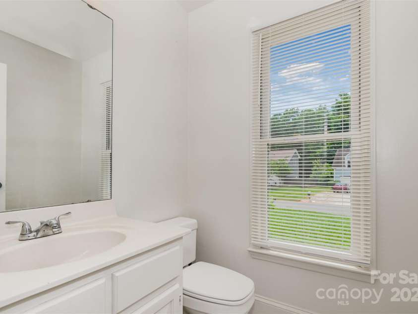 8429 Meadowcroft Court, Charlotte, NC 28215.  MLS# CAR4263498, YatesRealty ID 16860. Main floor half bath