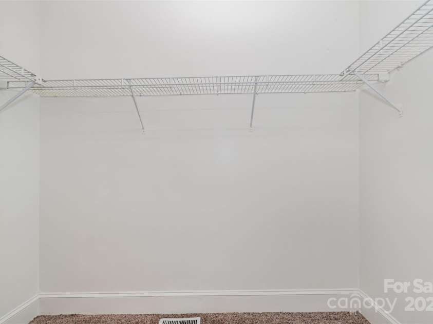 8429 Meadowcroft Court, Charlotte, NC 28215.  MLS# CAR4263498, YatesRealty ID 16860. Main floor primary walk in closet