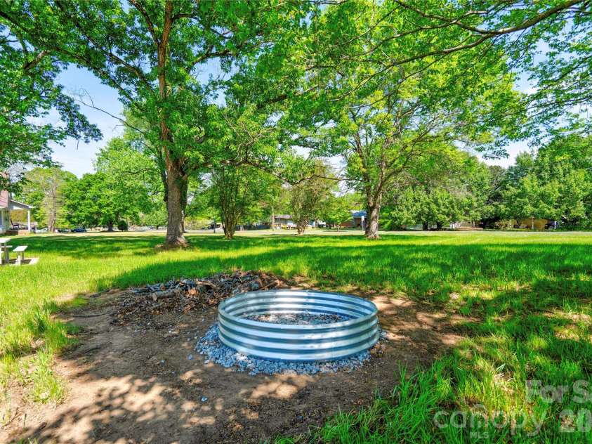 807 Orchard Street, Shelby, NC 28152.  MLS# CAR4370214, YatesRealty ID 16861. Rear Yard - Firepit