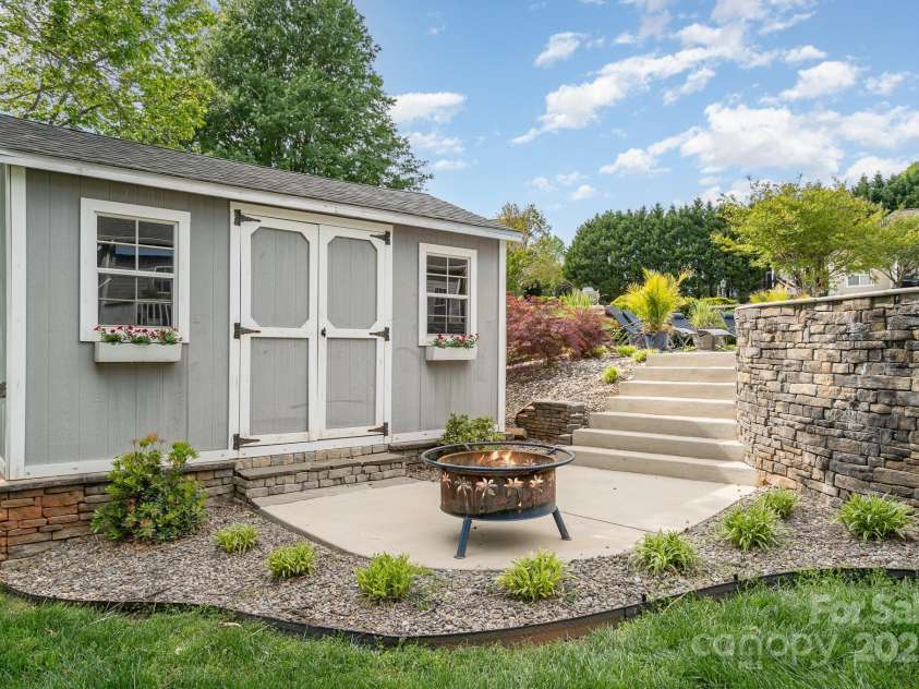 130 Hopedale Court, Mooresville, NC 28117.  MLS# CAR4245050, YatesRealty ID 16862. Charming shed for storage