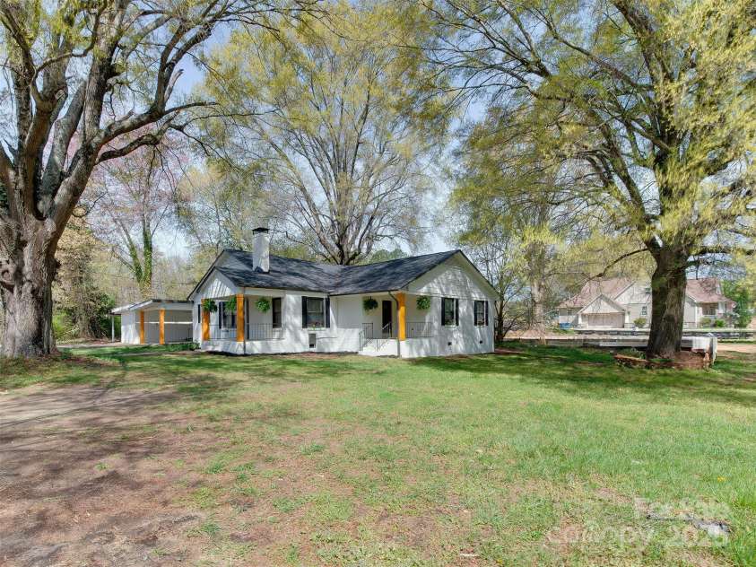 1209 Mount Ulla Highway, Mooresville, NC 28115.  MLS# CAR4242312, YatesRealty ID 16865. Mature Trees