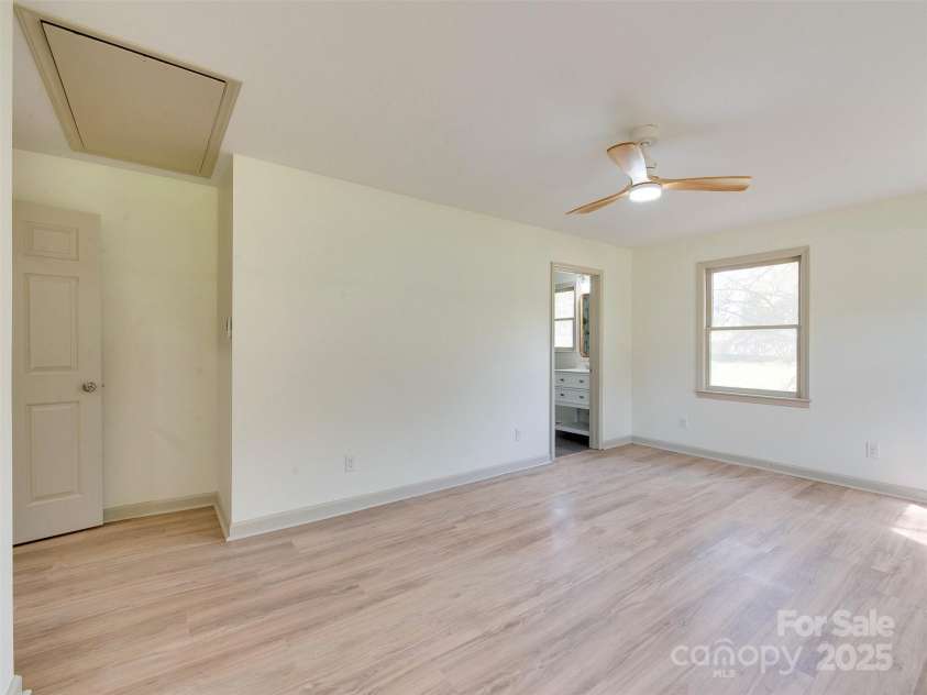 1209 Mount Ulla Highway, Mooresville, NC 28115.  MLS# CAR4242312, YatesRealty ID 16865. Primary Bedroom