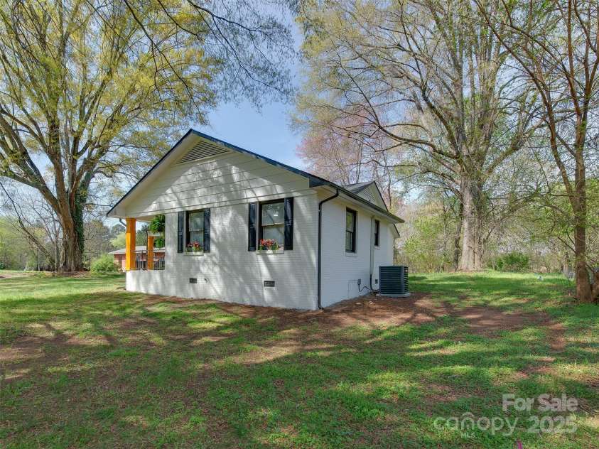 1209 Mount Ulla Highway, Mooresville, NC 28115.  MLS# CAR4242312, YatesRealty ID 16865. Side View