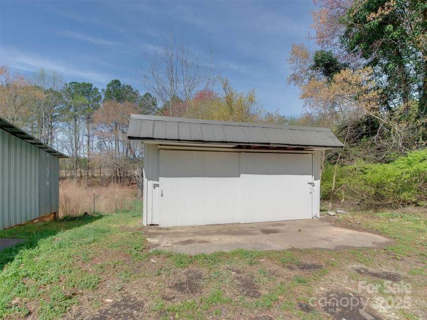 1209 Mount Ulla Highway, Mooresville, NC 28115.  MLS# CAR4242312, YatesRealty ID 16865. Storage Building