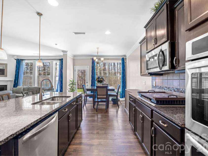 2408 Winding River Drive, Charlotte, NC 28214.  MLS# CAR4357209, YatesRealty ID 16865. Modern kitchen with ample cabinet space and updated finishes