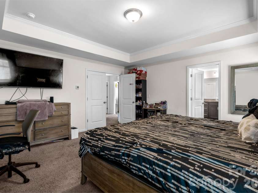 2408 Winding River Drive, Charlotte, NC 28214.  MLS# CAR4357209, YatesRealty ID 16865. Primary bedroom with ample space and relaxing layout